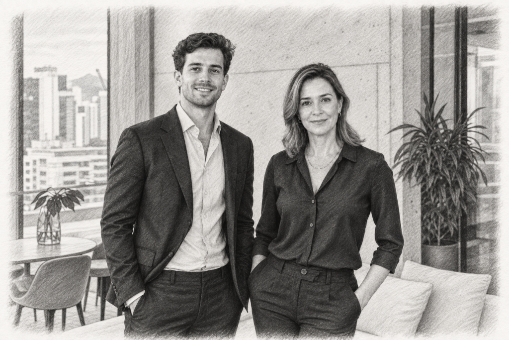 Protect Equity With A Luxury Real Estate Inspection Negotiation Strategy 1 Charcoal portrait of a man in a jacket and a woman in a dark blouse beside a pale stone wall.