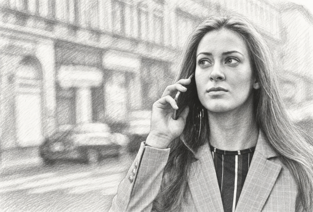 Woman talking on a phone near a residential street.